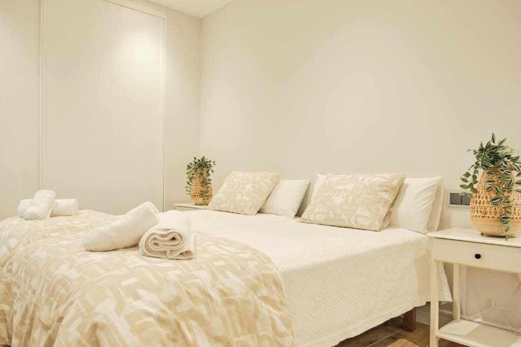 Łóżko lub łóżka w pokoju w obiekcie CASA ROLAO Elegante Casa Familiar 10 personas
