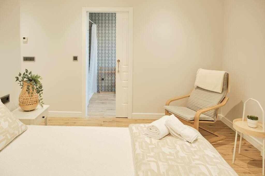 Łóżko lub łóżka w pokoju w obiekcie CASA ROLAO Elegante Casa Familiar 10 personas
