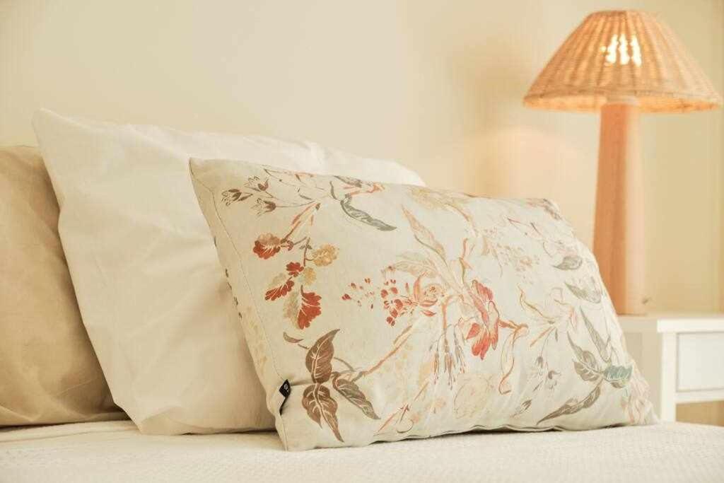 Łóżko lub łóżka w pokoju w obiekcie CASA ROLAO Elegante Casa Familiar 10 personas