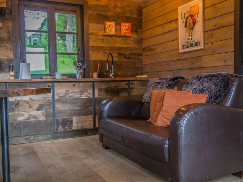 Posezení v ubytování Romantic Chalet in Ferrières with Hot Tub