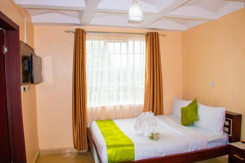 Postel nebo postele na pokoji v ubytování Luna hotel