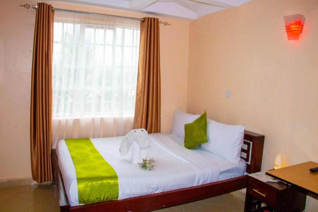 Postel nebo postele na pokoji v ubytování Luna hotel