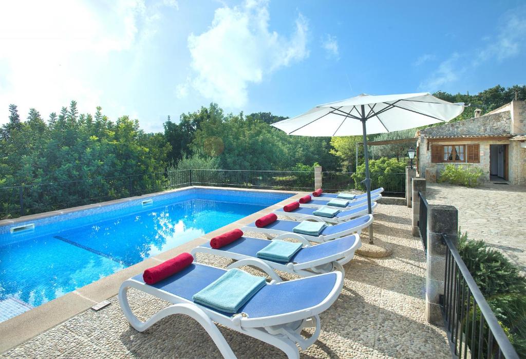 The swimming pool at or close to Owl Booking Villa Sedes - Dive Into Nature