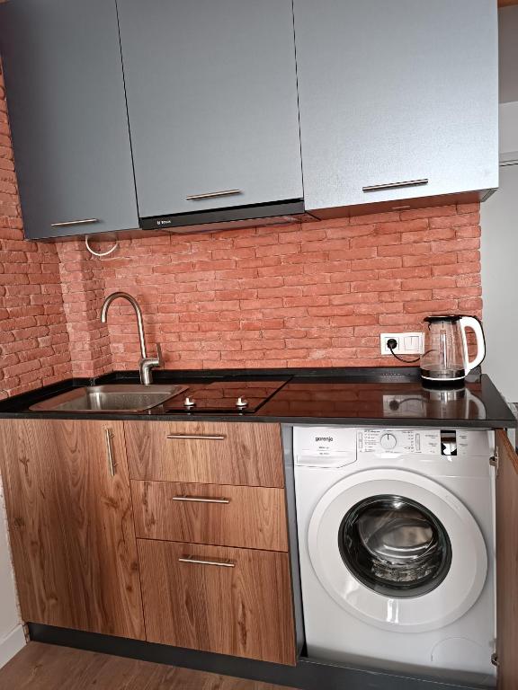 Kuchyň nebo kuchyňský kout v ubytování Apartment with a great view 544