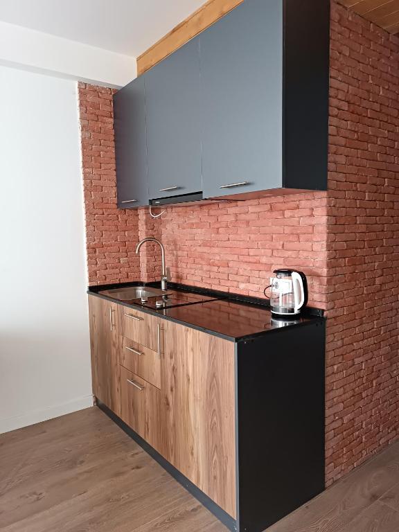 Kuchyň nebo kuchyňský kout v ubytování Apartment with a great view 544