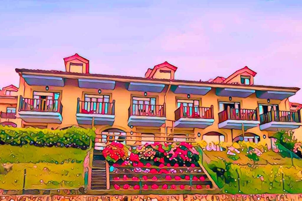 Zahrada ubytování Casa de Las Flores - Apartamento con jardín privado frente a la Playa de Comillas