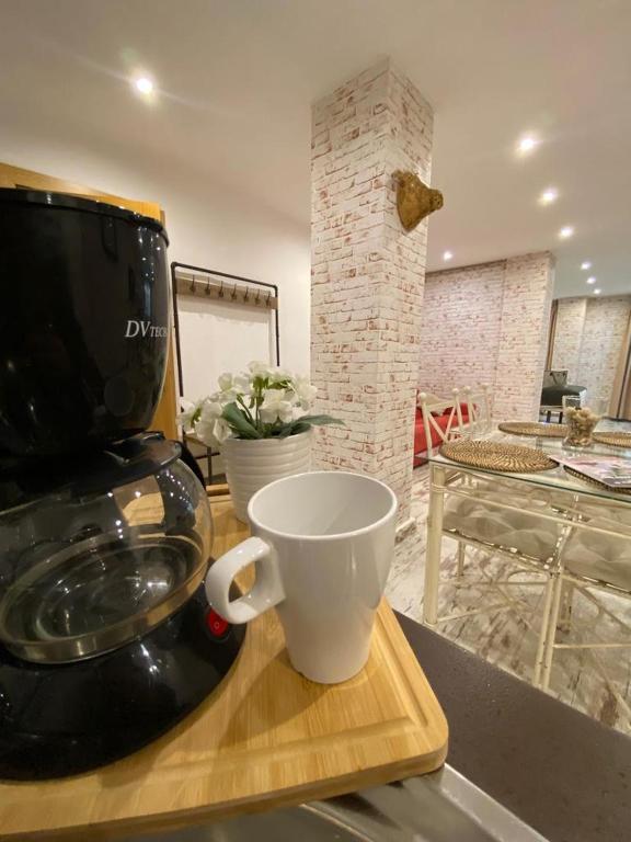 Kuchyňa alebo kuchynka v ubytovaní Apartamentos Sevilla Palace