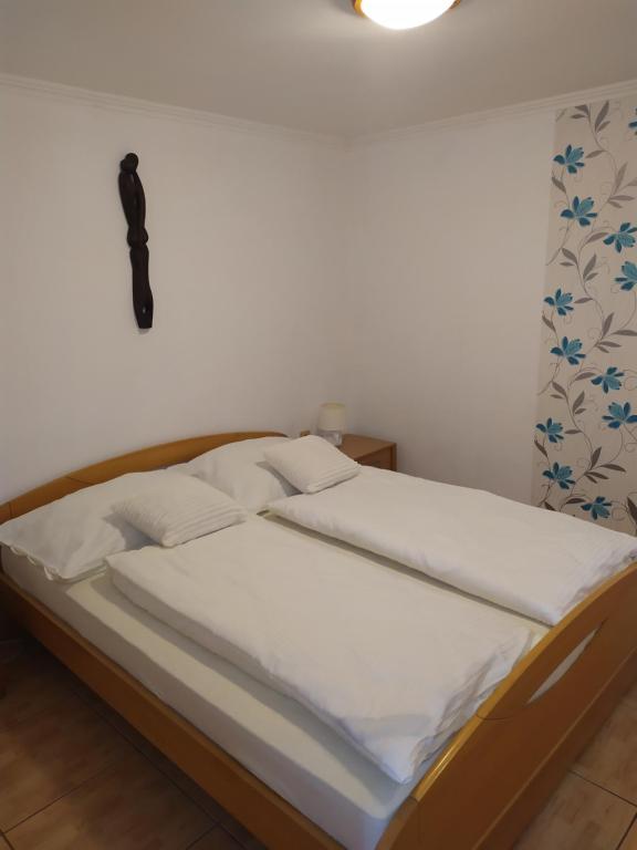 Postel nebo postele na pokoji v ubytování Apartmány Orava - Zuberec