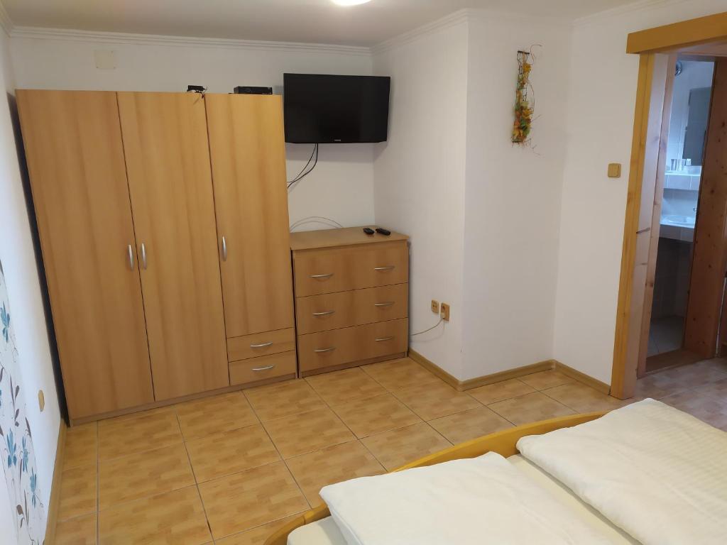 Postel nebo postele na pokoji v ubytování Apartmány Orava - Zuberec