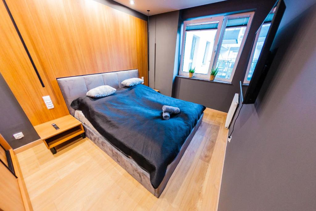 Posteľ alebo postele v izbe v ubytovaní Euro Riverside Luxury Apartment 2