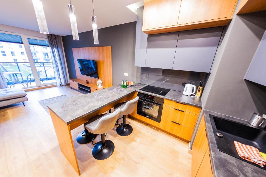 Kuchyňa alebo kuchynka v ubytovaní Euro Riverside Luxury Apartment 2