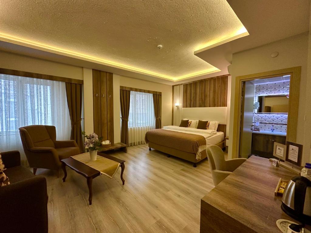 Postel nebo postele na pokoji v ubytování Line Suite Hotel