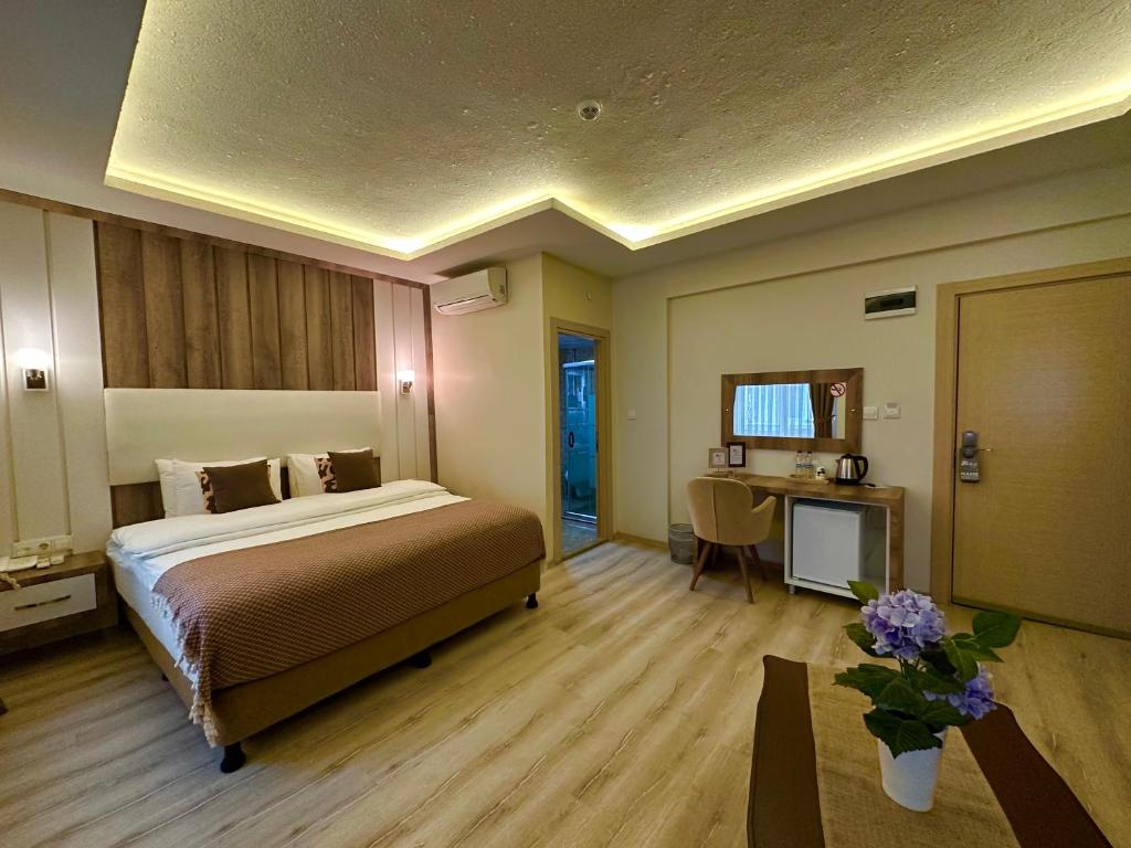 Postel nebo postele na pokoji v ubytování Line Suite Hotel