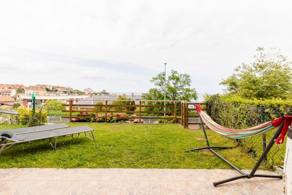 Zahrada ubytování Casa de Las Flores - Apartamento con jardín privado frente a la Playa de Comillas