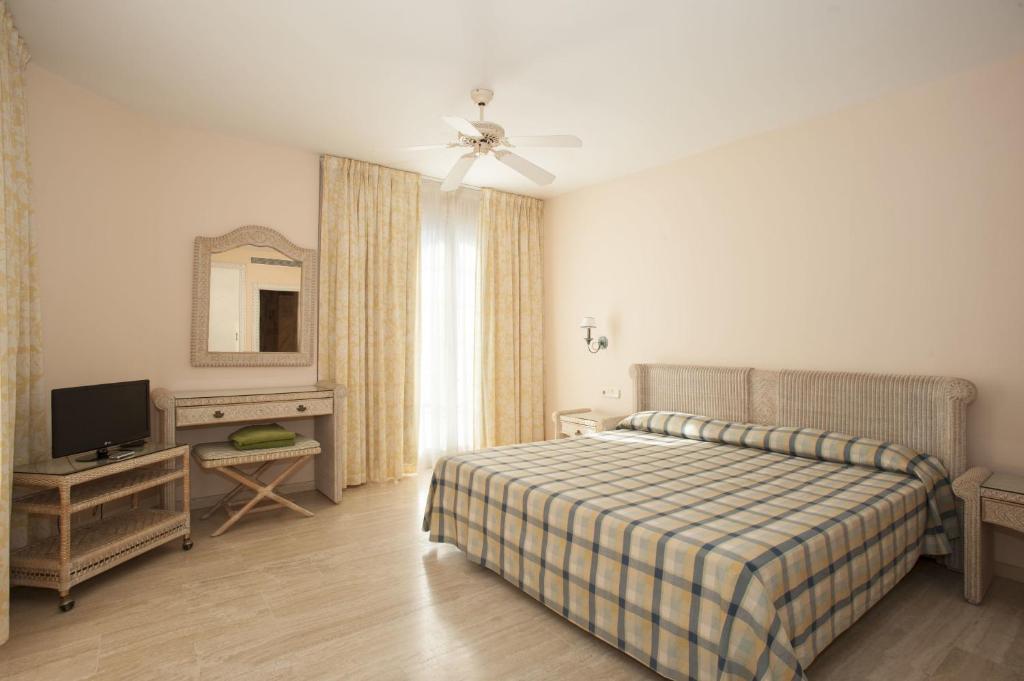 Letto o letti in una camera di Palm Oasis Maspalomas