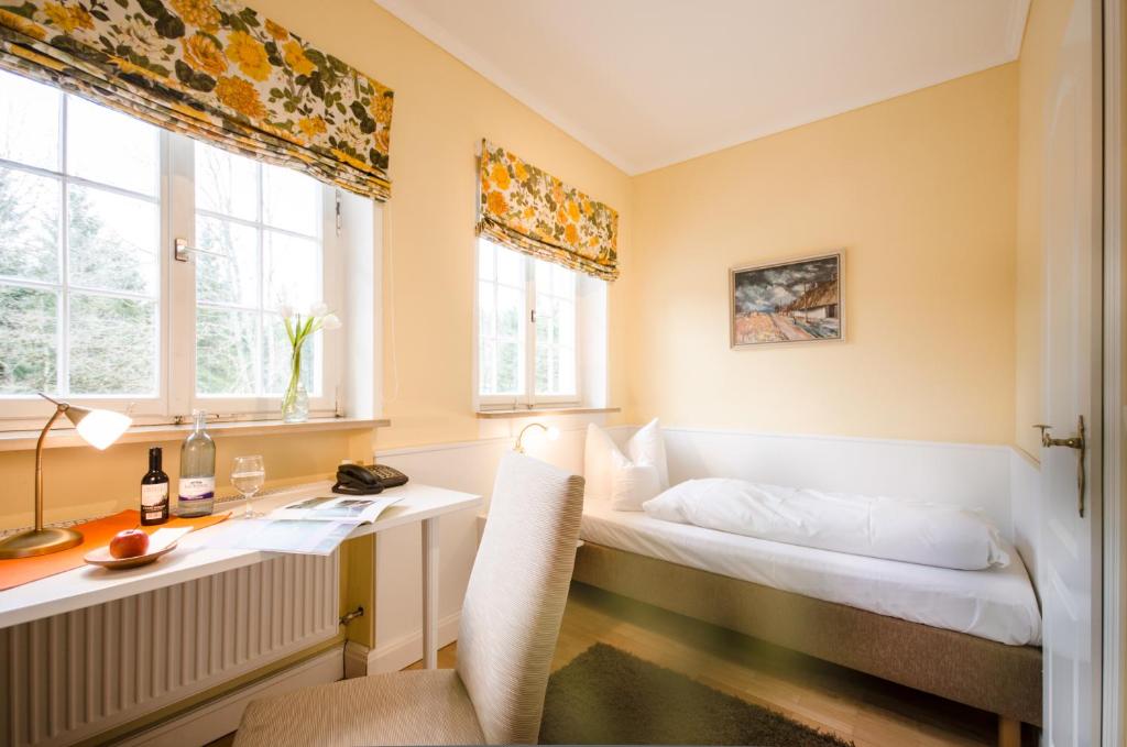 Postel nebo postele na pokoji v ubytování Hotel Waldsee