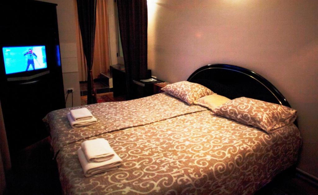 Postel nebo postele na pokoji v ubytování B&B Stadion