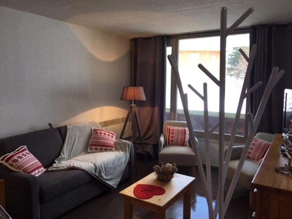 Posezení v ubytování Appartement 2 pièces cabine, 6/7 pers, proche pistes, confort familial - FR-1-404-160