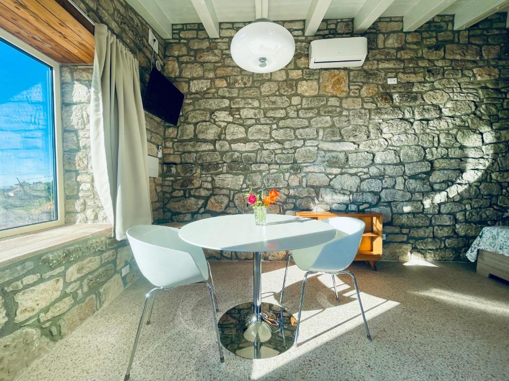 Posezení v ubytování LA CASETTA SULLE NUVOLE PETRA