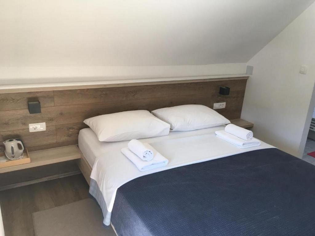 Posteľ alebo postele v izbe v ubytovaní Guesthouse Family Bosnic