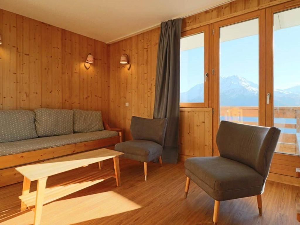 Appartement Montvalezan-La Rosière, 2 pièces, 6 personnes - FR-1-398-540にあるシーティングエリア