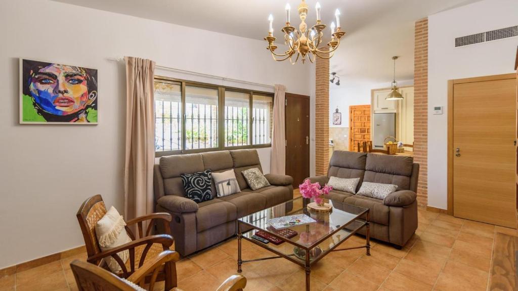 A seating area at Casa rural cerca de Aracena Castillo de las Guardas by Ruralidays