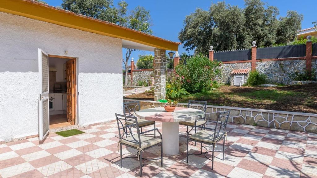 A garden outside Casa rural cerca de Aracena Castillo de las Guardas by Ruralidays