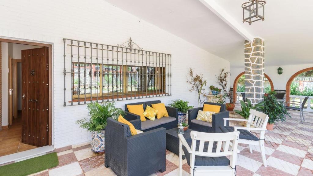 A seating area at Casa rural cerca de Aracena Castillo de las Guardas by Ruralidays