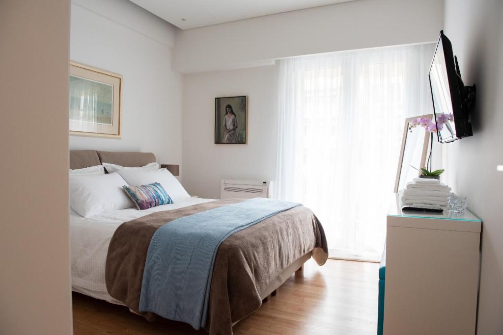 Posteľ alebo postele v izbe v ubytovaní Katia Modern Apartment in Athens