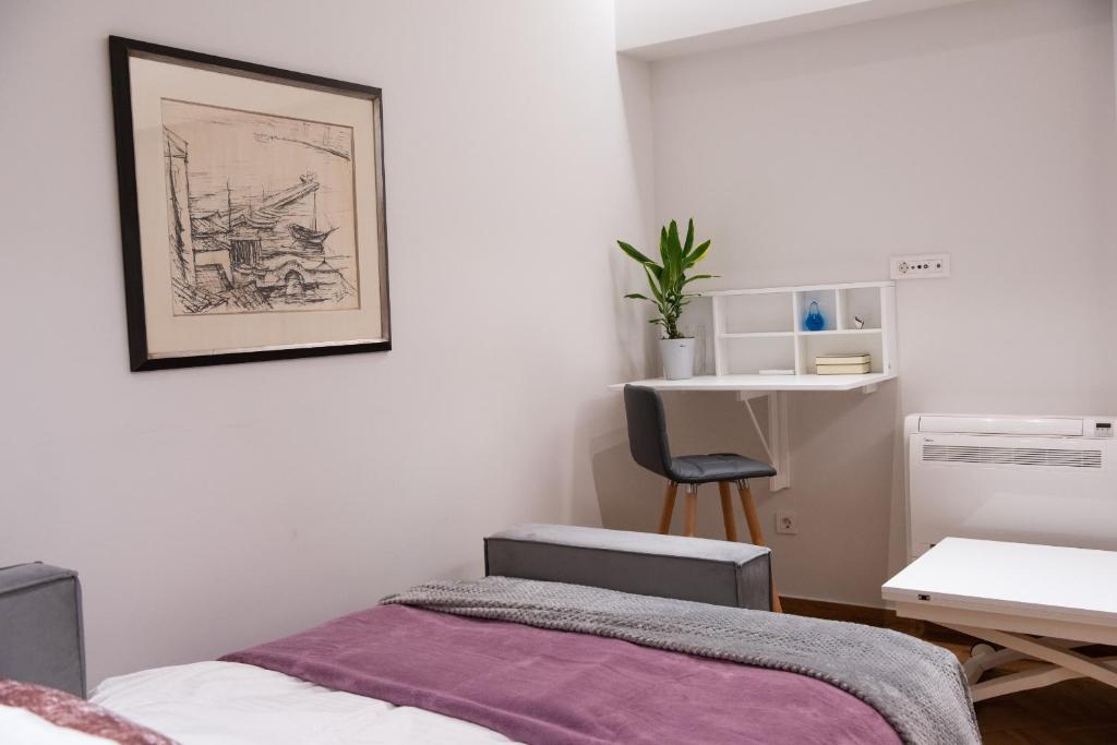 Posteľ alebo postele v izbe v ubytovaní Katia Modern Apartment in Athens