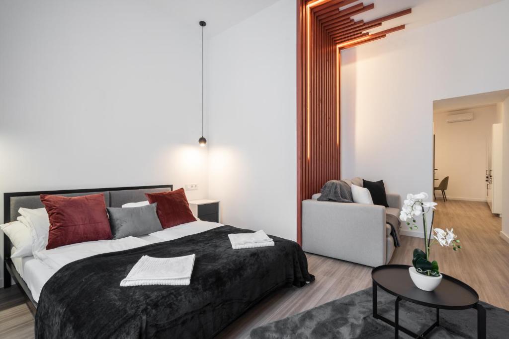 Postel nebo postele na pokoji v ubytování KL26- Quality Apartments, Best Location. By BQA