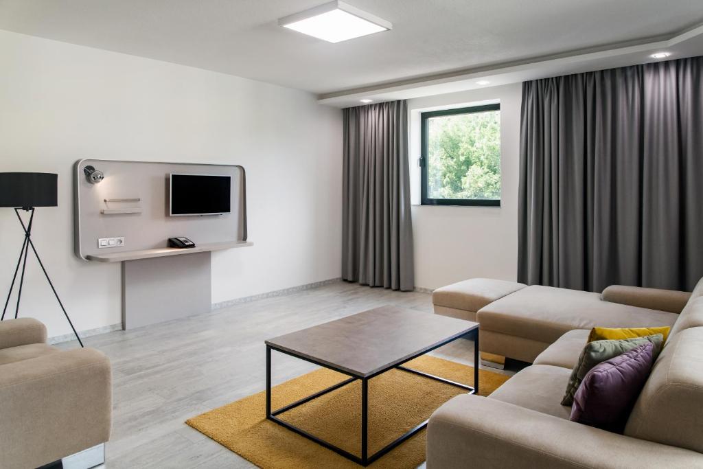 Televízia a/alebo spoločenská miestnosť v ubytovaní Park Inn by Radisson Danube Bratislava