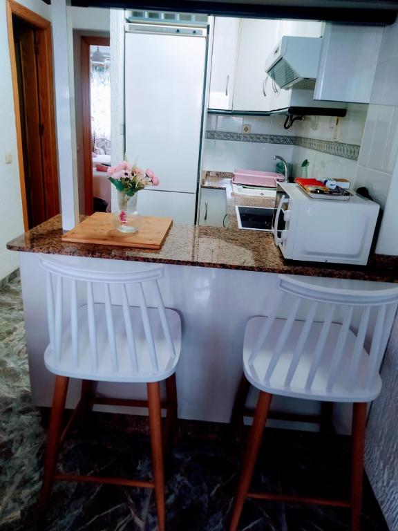 Kuchyň nebo kuchyňský kout v ubytování Apartamento coqueto