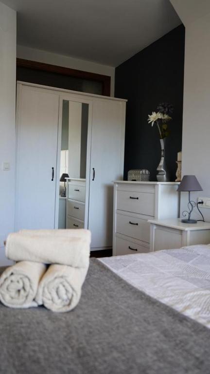 A bed or beds in a room at Mirador De La Axarquia