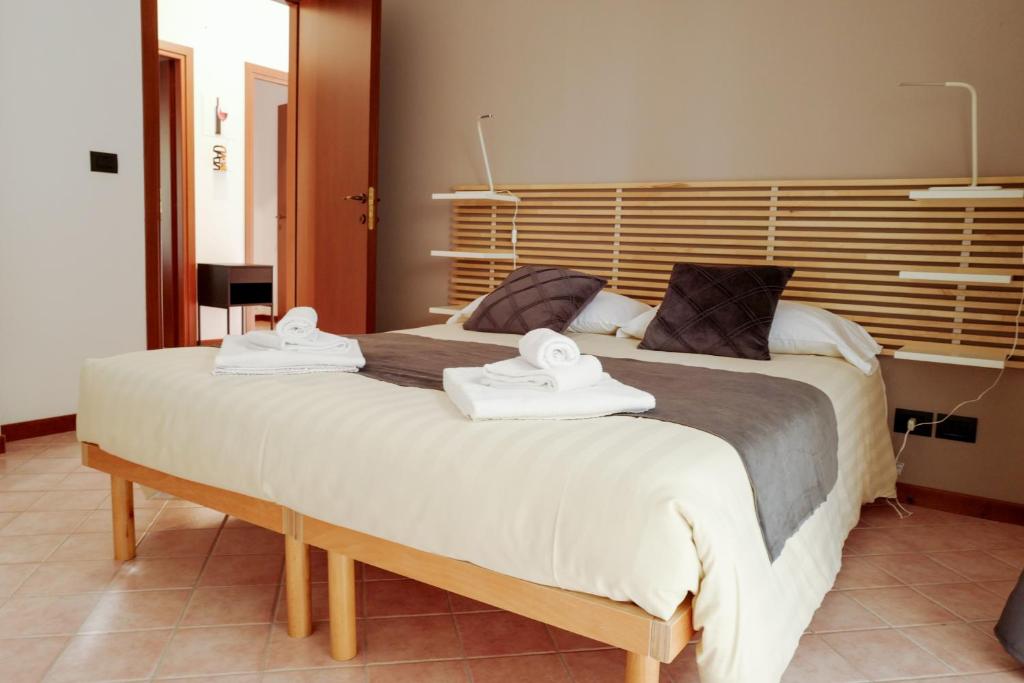 Cama o camas de una habitación en MonfortOM - Residenza Lavinia - Monforte d'Alba