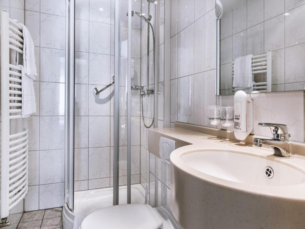 Koupelna v ubytování Hotel Louis Müller