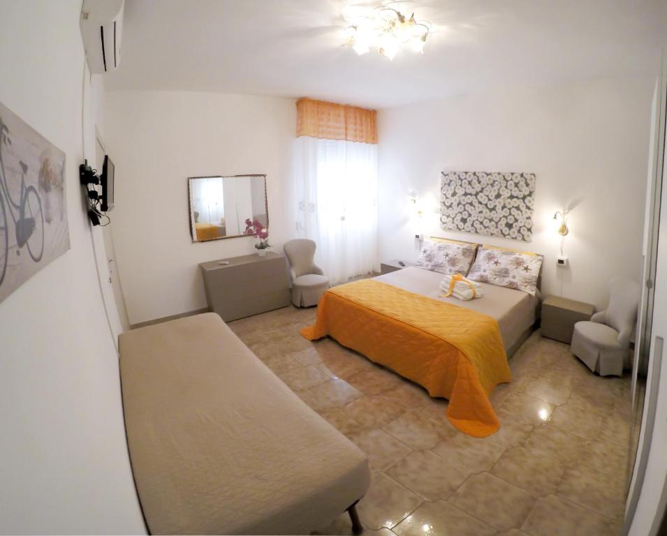 Postel nebo postele na pokoji v ubytování B&B La Strea