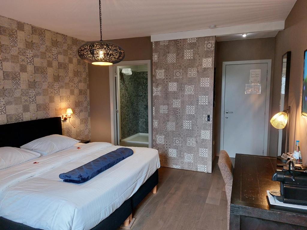 Postel nebo postele na pokoji v ubytování B&B Bloonwinning