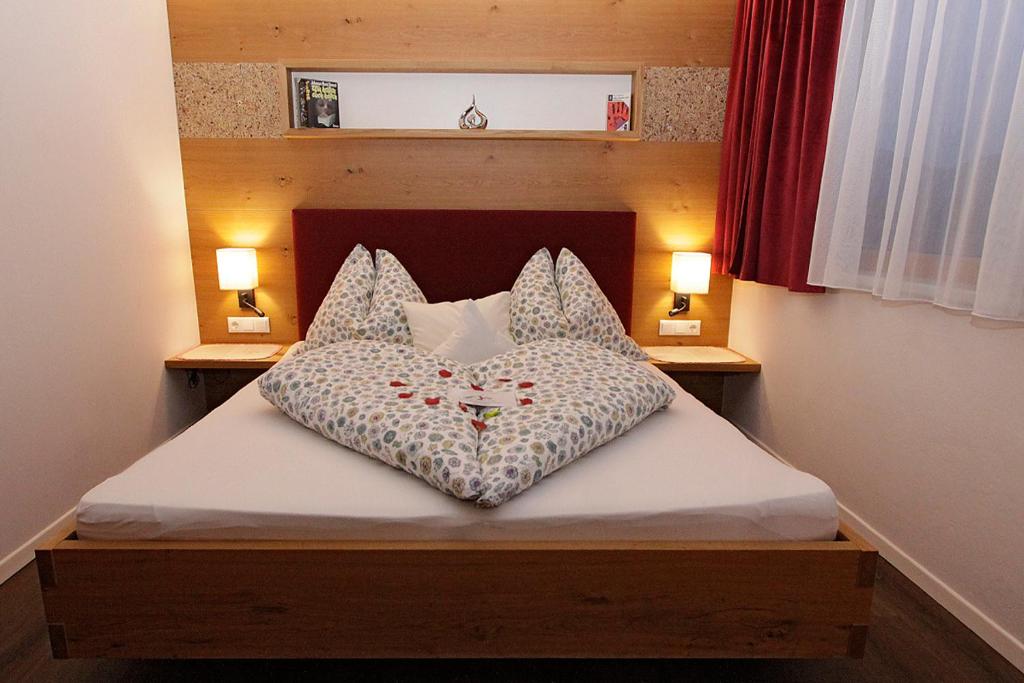 Postel nebo postele na pokoji v ubytování Gästehaus Steinerhof