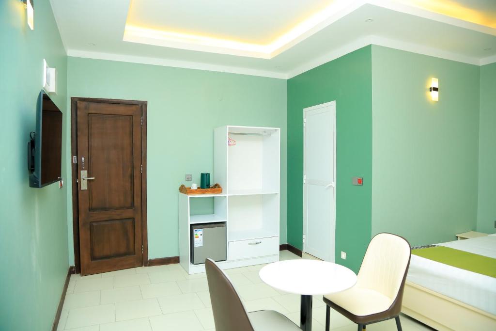 TV a/nebo společenská místnost v ubytování Hotel Amaranth