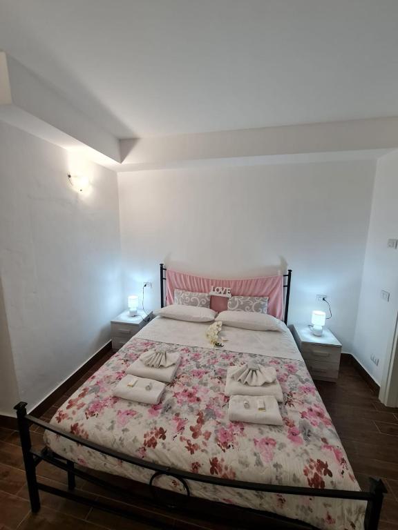 Postel nebo postele na pokoji v ubytování Curti Granda