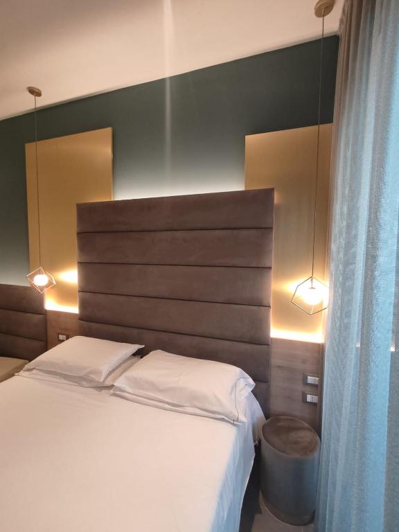 Postel nebo postele na pokoji v ubytování Park Hotel Morigi Garden & Spa