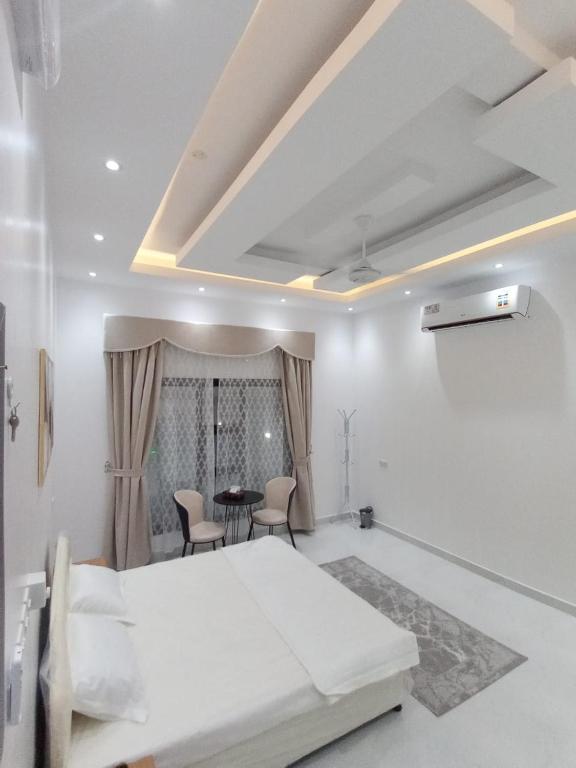 Katil atau katil-katil dalam bilik di استراحة مارينا ضباب marina dibab guste house