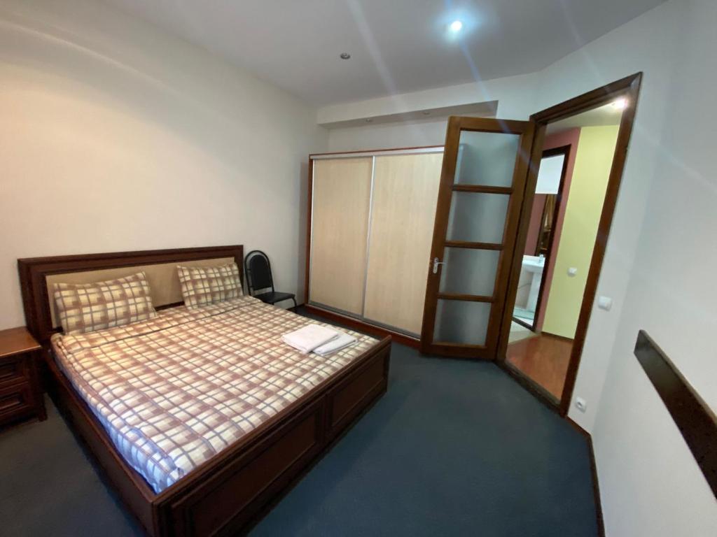 Postel nebo postele na pokoji v ubytování Central Apartaments of Stefan cel Mare Boulevard in Chisinau