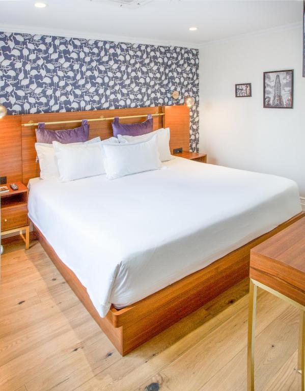 Postel nebo postele na pokoji v ubytování Hotel Scherman