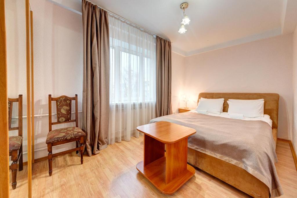 Letto o letti in una camera di Holosiyvsky Hotel