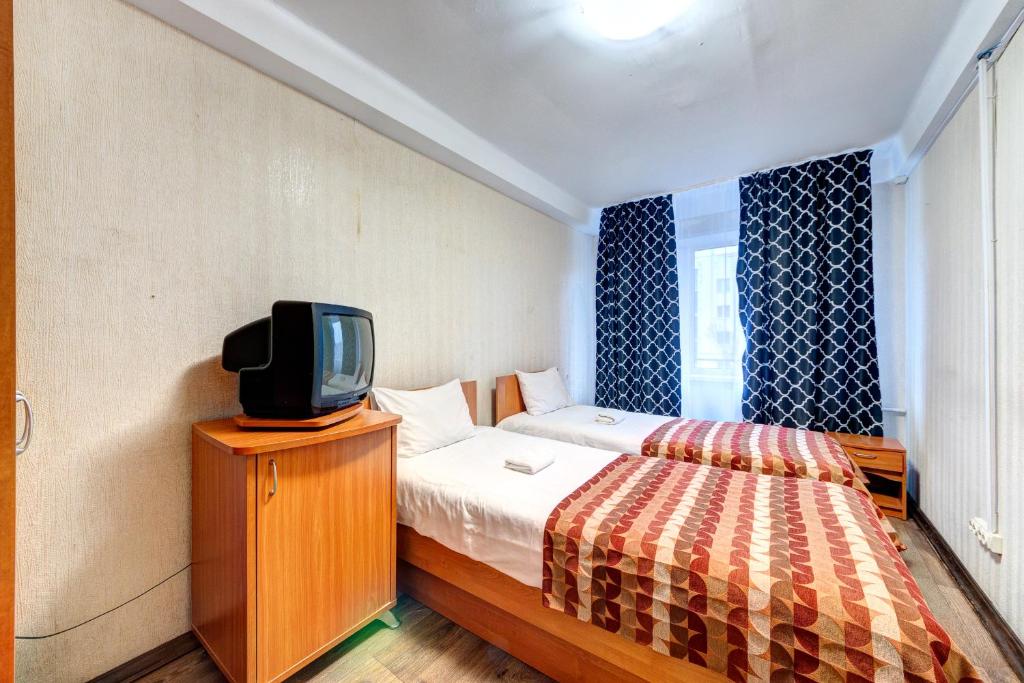 Letto o letti in una camera di Holosiyvsky Hotel