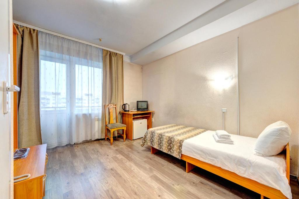 Letto o letti in una camera di Holosiyvsky Hotel