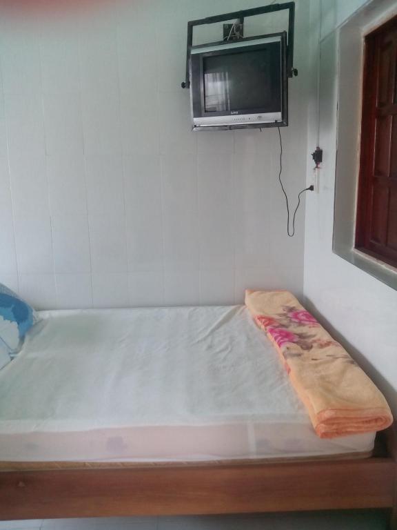 Postel nebo postele na pokoji v ubytování Hai Anh Guesthouse