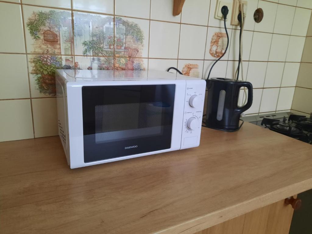 Kuchyňa alebo kuchynka v ubytovaní Apartmán Chiarita
